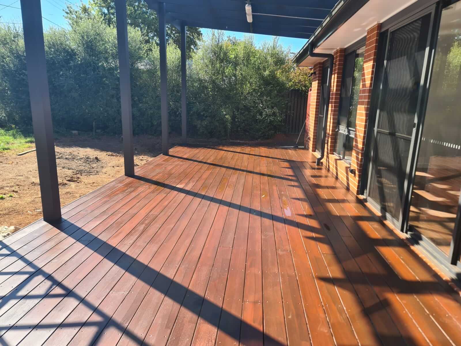 Timber deck sanded and re-oiled by ID Painting, Canberra — photo 1